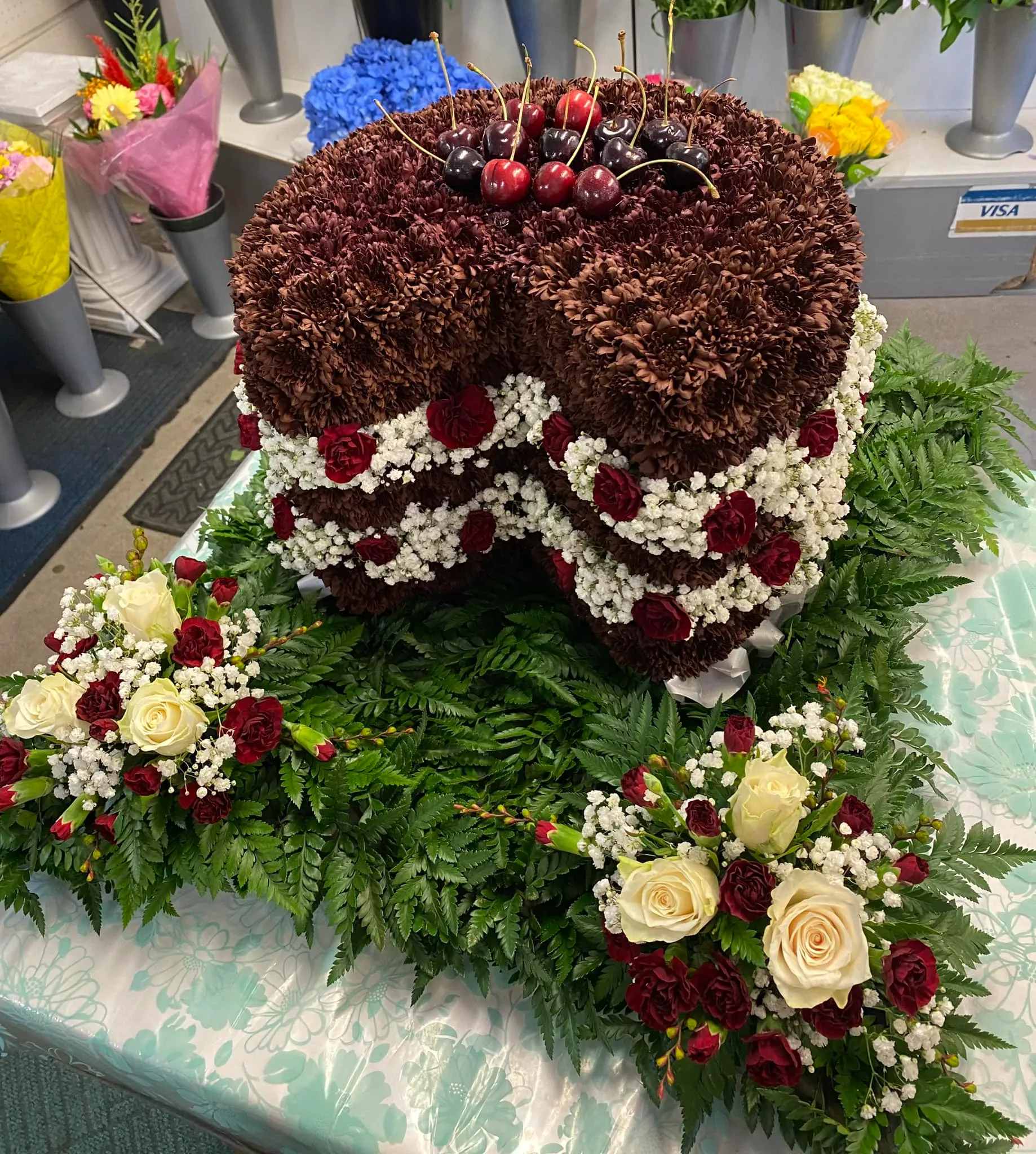 A chocolate cake sitting on top of a table.