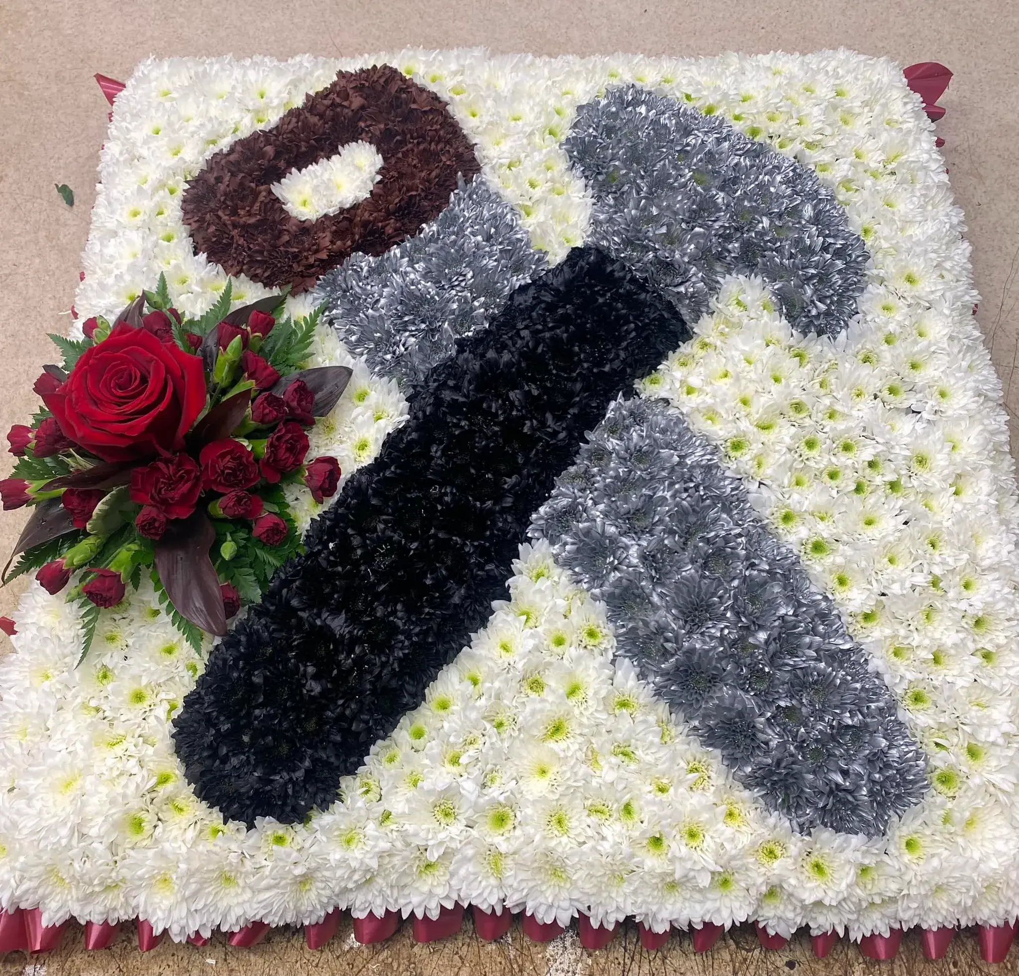 A cake with flowers on top of it.