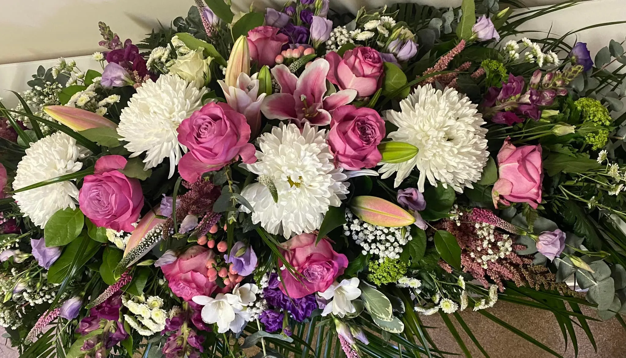 A bunch of flowers that are sitting on a table.