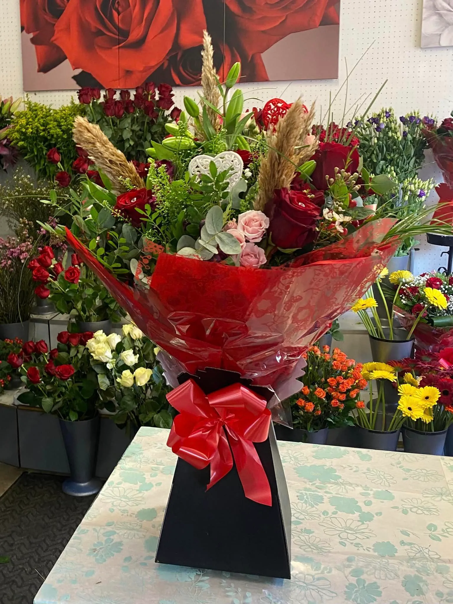 a bunch of flowers that are sitting on a table